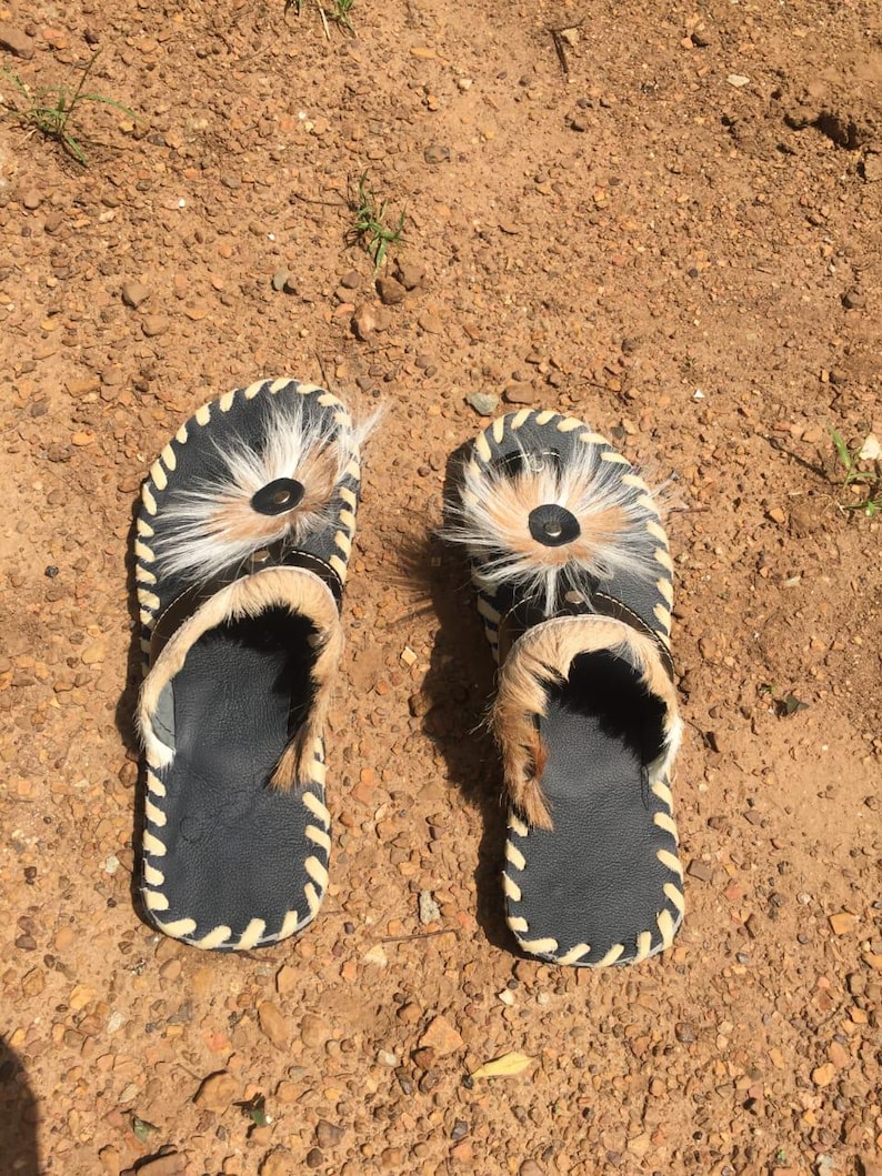Handcrafted Zulu Imbadada sandals made from genuine springbok hide, traditional African footwear with historical significance.