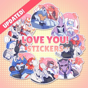 Op de afbeelding: Een verzameling cartoonstickers met verschillende robotpersonages in blauw, rood, paars en wit. De stickers zijn gerangschikt in een cirkelvormig patroon met roze hartaccenten en de tekst "LOVE YOU! STICKERS". Een rode banner leest "UPDATED!"