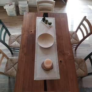Unique design table in chestnut wood and epoxy resin with handmade rusty effect iron feet