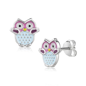 May include: A pair of silver stud earrings featuring a blue and pink enamel owl design.