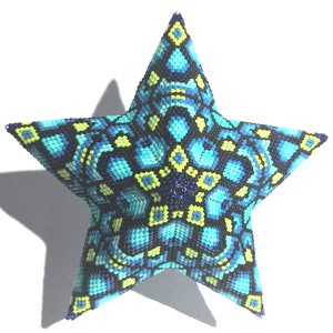 May include: A blue, yellow, and black beaded star ornament. The star is made of small beads and has a geometric pattern.