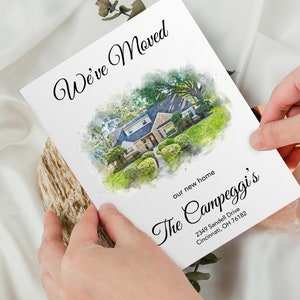Custom watercolor house portrait moving announcement card. Personalized new home stationery with elegant cursive script, shown held by hands over a minimalist aesthetic background.
