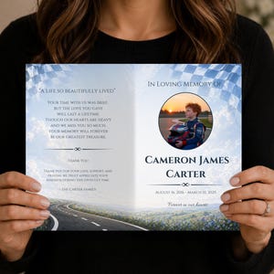 May include: A memorial card featuring a photograph of a young person in a racing suit, with the text "In Loving Memory of Cameron James Carter". The card includes the dates August 16, 2016 - March 10, 2025, and the phrase "Forever in our hearts".