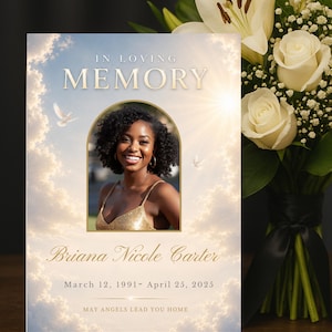 May include: A memorial card with a photo of a smiling woman, framed by an archway, set against a cloudy sky background. The text reads "IN LOVING MEMORY" and includes the name "Briana Nicole Carter" with birth and passing dates. White doves and a sunburst are also featured.