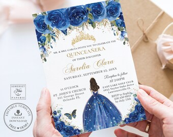 May include: Blue and gold Quinceañera invitation with a watercolor floral design, a crown, and a silhouette of a girl in a blue gown with stars. The text reads "MR. & MRS. GARCIA INVITE YOU TO CELEBRATE THE QUINCEAÑERA OF THEIR DAUGHTER AURELIA CLARA SATURDAY, SEPTEMBER 23, 20XX 11 O'CLOCK ST. JOHN'S CHURCH 331 George Street Orlando FL Reception to follow AT 2:00PM EAST LAKE GOLF CLUB 1633 Taylor Oaks Drive Lawrenceville FL RSVP to Sophia 256-456-8933 by July 15th"