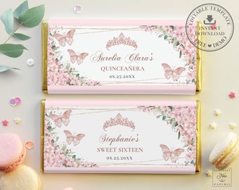 May include: Two pink and gold chocolate bar wrappers with floral designs and butterflies. The top wrapper says "Aurelia Clara's Quinceañera 08.25.20XX". The bottom wrapper says "Stephanie's Sweet Sixteen 08.25.20XX".