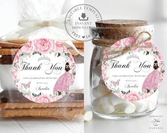 May include: Pink and white round thank you favor tags with a floral design and a princess silhouette. The text reads "Thank You for celebrating with me! With love, Aurelia".