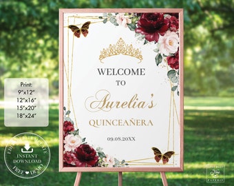 Peut inclure: Une pancarte d'accueil imprimable pour une Quinceañera. La pancarte présente un cadre géométrique doré avec un motif floral bordeaux et blush, une couronne dorée et des papillons. Le texte sur la pancarte indique "Bienvenue à Aurelia's Quinceañera 09.08.20XX".