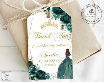 May include: A white thank you tag with a gold geometric frame and green floral design. The text reads "Thank You for celebrating with us! Aurelia's Quinceañera 08.25.20XX".