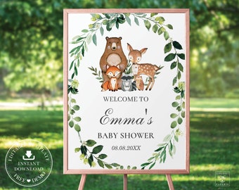 Op de afbeelding: Een welkomstbord voor een babyshower met een bos-thema. Het bord heeft een krans van groene bladeren met een beer, vos, hert, wasbeer en uil erin. De tekst luidt "Welkom op Emma's babyshower 08.08.20XX".