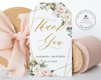 May include: A white thank you tag with gold geometric accents and floral illustrations. The text "Thank You" is written in gold script. The tag also includes the names "Madison + Matthew" and the date "08.25.20XX".