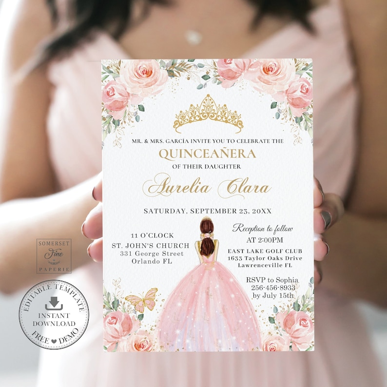 May include: A pink and gold Quincea&ntilde;era invitation with a floral design. The invitation features a drawing of a young woman in a pink dress and a gold crown. The text on the invitation reads "MR. & MRS. GARC&Iacute;A INVITE YOU TO CELEBRATE THE QUINCEA&Ntilde;ERA OF THEIR DAUGHTER Aurelia Clara SATURDAY, SEPTEMBER 23, 20XX 11 O'CLOCK ST. JOHN'S CHURCH 331 George Street Orlando FL Reception to follow AT 2:00PM EAST LAKE GOLF CLUB 1633 Taylor Oaks Drive Lawrenceville FL RSVP to Sophia 256-456-8933 by July 15th"