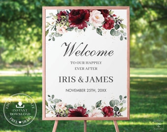 May include: A wedding welcome sign with a burgundy and blush floral design. The sign says "Welcome to our happily ever after Iris & James November 25th, 20XX".