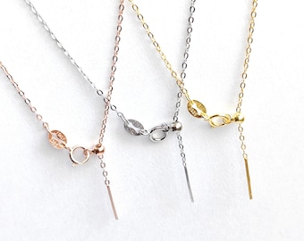 May include: Three delicate gold chains with adjustable lengths. The chains are in silver, gold, and rose gold.