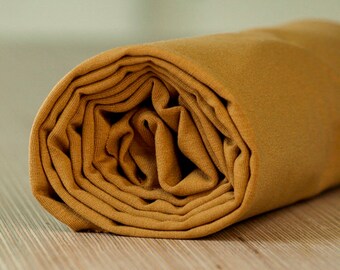 conoce LECHE Lyocell Tencel™ /Jersey (MOSTAZA)