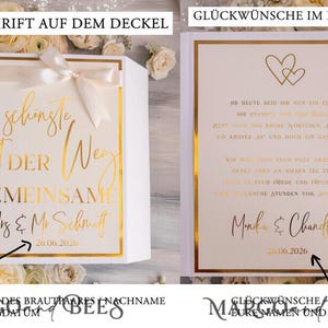 May include: A white box with a gold border and a white ribbon. The text on the box reads "Der sch&ouml;nste Weg ist der gemeinsame" and "Mrs & Mr Schmitt 20.06.2020". A white box with a gold border and a gold heart design. The text on the box reads "Ihr heute seid ihr nur ein Paar, die Zukunft vor euch ist wunderbar.  Habt heute das kleine Wortchen Ja gefunden, ein kleines Ja und doch ein ganzes Leben. Wir w&uuml;nschen euch daf&uuml;r ganz viel Gl&uuml;ck, denkt gern an diesen Tag zur&uuml;ck.  W&uuml;nschen euch Frieden und Freude eines, viele sch&ouml;ne Stunden vor euch.  Monika & Chandler 20.06.2026"