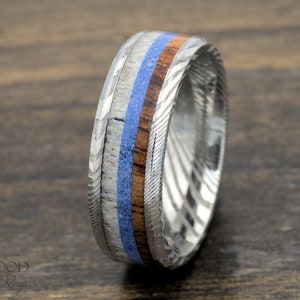 Handcrafted Damascus Steel Ring with Koa Wood, Lapis Lazuli, and Deer Antler Inlay