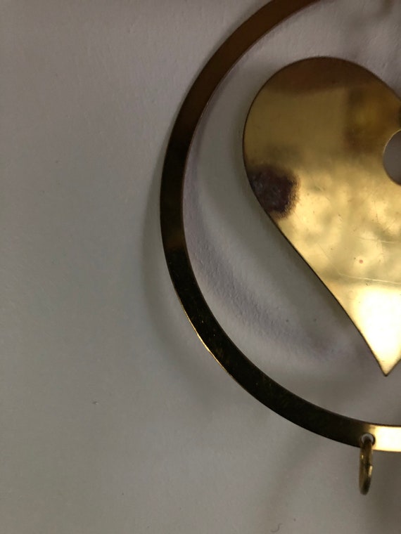 Made in Finland A rare and huge vintage Aarikka metal mobile designed