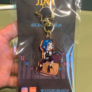 JINXED Mini-série breloque porte-clés holographique de 5 cm de haut