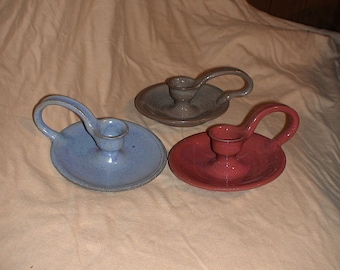 1 candlestick (red, blue or brown)