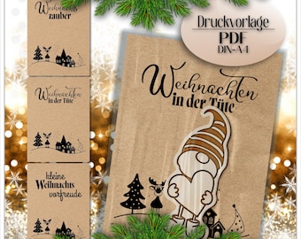 Puede incluir: Imagen de tarjetas navideñas y un adorno de gnomo. Las tarjetas presentan siluetas negras de árboles, casas y renos. La tarjeta principal dice "Weihnachten in der Tüte" con un gnomo sosteniendo un corazón.