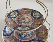 Imari Wear Japan Set of 2 small plates with brass stand