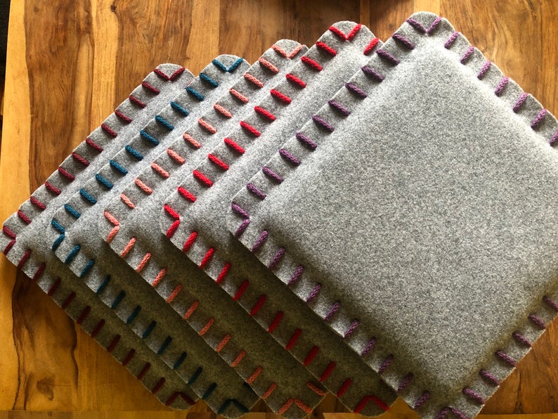 Chair cushion made of wool felt in light gray image 1