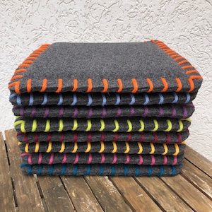 Wool felt chair cushion in dark grey