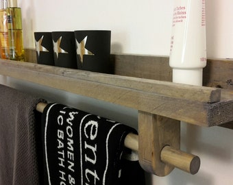 Bathroom shelf with towel holder