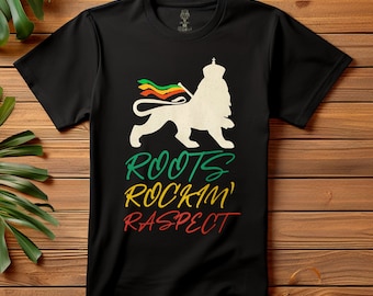 May include: Black t-shirt with a white lion graphic holding a green, yellow, and red flag. The text "ROOTS ROCKIN' RASPECT" is printed below the lion in green, yellow, and red.