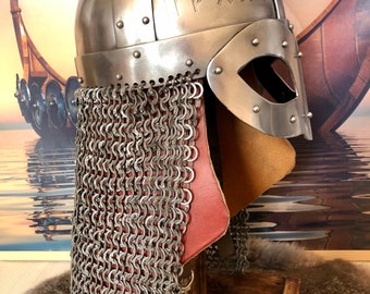 Viking Dragon 14g Helmet with Aventail and a heavy leather neck protector. Fits head up to 25-26 inches. Weight 6.5 lbs. Made to order.