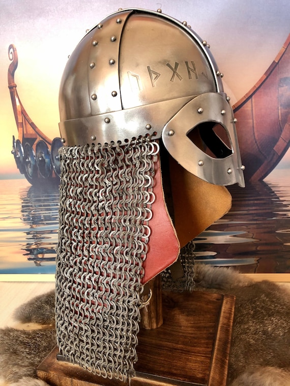 Viking Dragon 14g Helmet with Aventail and a heavy leather neck protector. Fits head up to 25-26 inches. Weight 6.5 lbs. Made to order.