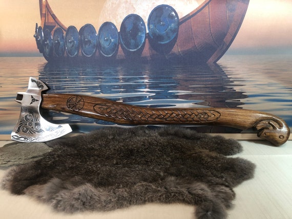 The All Father Viking fighting Axe a thing of Norse Beauty sharpened high carbon steel and battle ready.