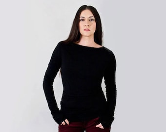 May include: A long-sleeved black shirt with a wide boat neckline and fitted sleeves, paired with dark burgundy trousers that feature a straight-leg cut and pockets at the hips, creating a simple and cohesive two-piece outfit ensemble.