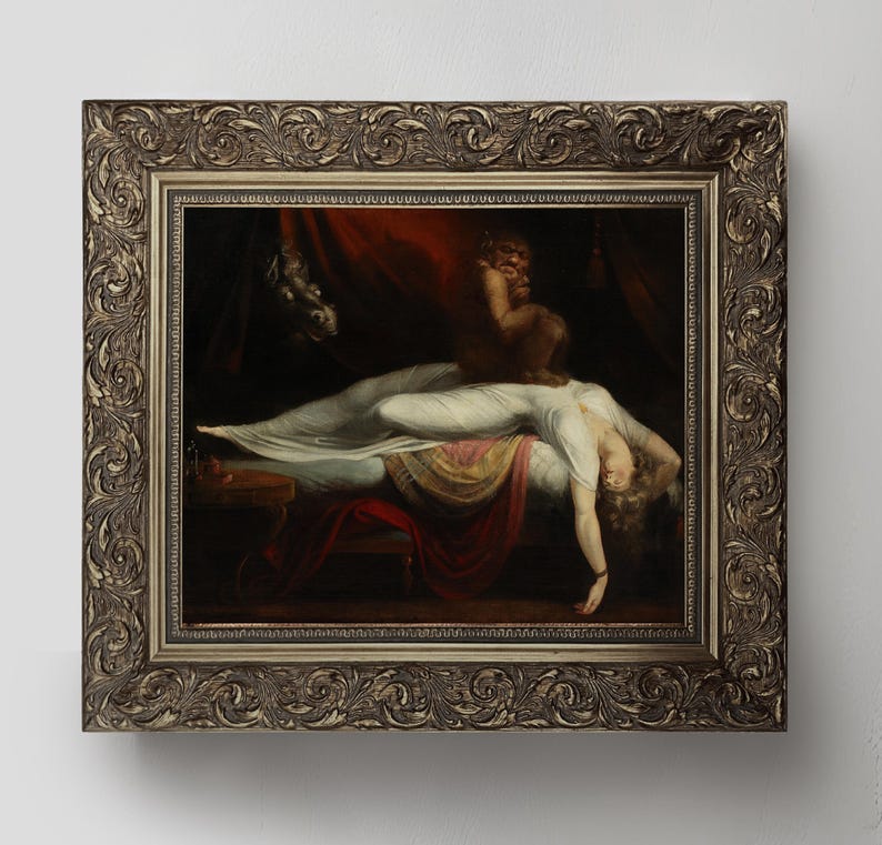 May include: A framed oil painting depicting a woman asleep in a bed with a shadowy figure standing over her. The woman is wearing a white nightgown and has long, flowing hair. The figure is wearing a dark robe and has a menacing expression on its face. The painting is set in a dark room with a red curtain in the background.