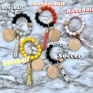 silicone wristlet, personalized keys, beaded keychain, custom name gift, keychain wallet, bridesmaid favor, teacher present, hands free holder, engraved pendant, mothers day idea, stretch bracelet, gift for women, trendy accessories, personalized wristlet keychain, custom beaded wristlet, name keychain gift, silicone bead bracelet, wallet wristlet keychain, engraved wood disc keychain, bridesmaid proposal favor, teacher appreciation gift, handsfree key holder, womens personalized keychain