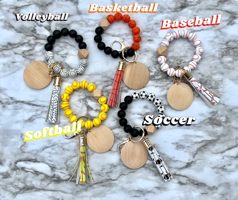 silicone wristlet, personalized keys, beaded keychain, custom name gift, keychain wallet, bridesmaid favor, teacher present, hands free holder, engraved pendant, mothers day idea, stretch bracelet, gift for women, trendy accessories, personalized wristlet keychain, custom beaded wristlet, name keychain gift, silicone bead bracelet, wallet wristlet keychain, engraved wood disc keychain, bridesmaid proposal favor, teacher appreciation gift, handsfree key holder, womens personalized keychain
