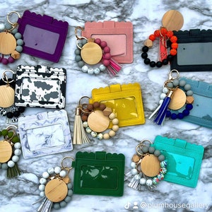 silicone wristlet, personalized keys, beaded keychain, custom name gift, keychain wallet, bridesmaid favor, teacher present, hands free holder, engraved pendant, mothers day idea, stretch bracelet, gift for women, trendy accessories, personalized wristlet keychain, custom beaded wristlet, name keychain gift, silicone bead bracelet, wallet wristlet keychain, engraved wood disc keychain, bridesmaid proposal favor, teacher appreciation gift, handsfree key holder, womens personalized keychain