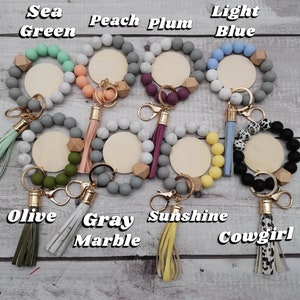 silicone wristlet, personalized keys, beaded keychain, custom name gift, keychain wallet, bridesmaid favor, teacher present, hands free holder, engraved pendant, mothers day idea, stretch bracelet, gift for women, trendy accessories, personalized wristlet keychain, custom beaded wristlet, name keychain gift, silicone bead bracelet, wallet wristlet keychain, engraved wood disc keychain, bridesmaid proposal favor, teacher appreciation gift, handsfree key holder, womens personalized keychain