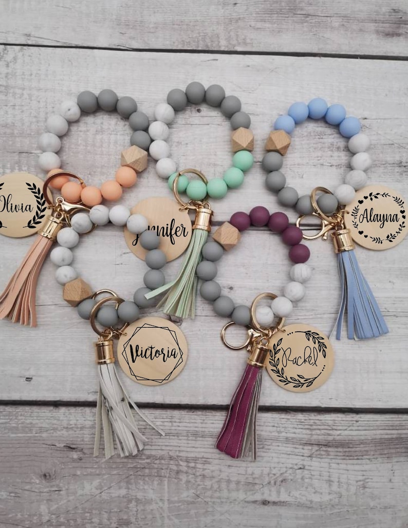silicone wristlet, personalized keys, beaded keychain, custom name gift, keychain wallet, bridesmaid favor, teacher present, hands free holder, engraved pendant, mothers day idea, stretch bracelet, gift for women, trendy accessories, personalized wristlet keychain, custom beaded wristlet, name keychain gift, silicone bead bracelet, wallet wristlet keychain, engraved wood disc keychain, bridesmaid proposal favor, teacher appreciation gift, handsfree key holder, womens personalized keychain