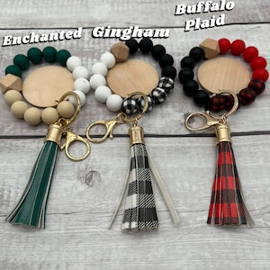 silicone wristlet, personalized keys, beaded keychain, custom name gift, keychain wallet, bridesmaid favor, teacher present, hands free holder, engraved pendant, mothers day idea, stretch bracelet, gift for women, trendy accessories, personalized wristlet keychain, custom beaded wristlet, name keychain gift, silicone bead bracelet, wallet wristlet keychain, engraved wood disc keychain, bridesmaid proposal favor, teacher appreciation gift, handsfree key holder, womens personalized keychain