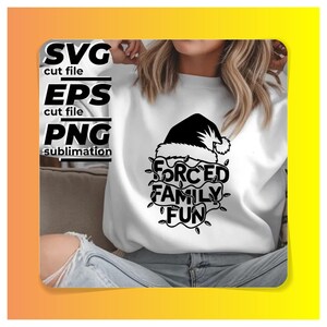 May include: White sweatshirt with a black graphic of a Santa hat and the words "FORCED FAMILY FUN" surrounded by string lights. The image also includes text that says "SVG cut file", "EPS cut file", and "PNG sublimation".