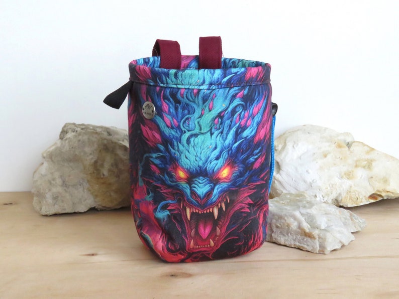 pink blue dragon graphic print on chalk bag for climber