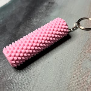 Pocket Stim Sensory Fidget Keychain with Built-In Lip Balm Holder