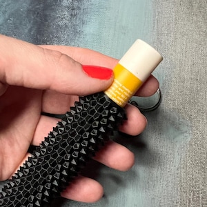 Spiky Sensory Fidget Keychain with Hidden Lip Balm Storage, Pocket Sized Tactile Stim Toy for On-the-Go Fidgeting and Function