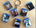 Miniature PS4 Keyring - Choose ANY Game, Gaming Bag Charm Gift for Gamers, Gaming Keychain product logo