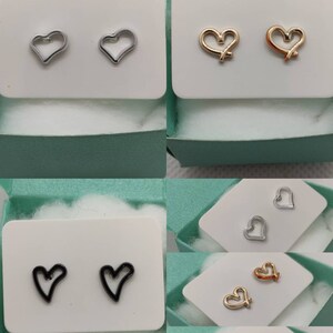 Minimalistic handmade gold, silver and black colored open playful design heart stud earrings hypoallergenic hearts studs