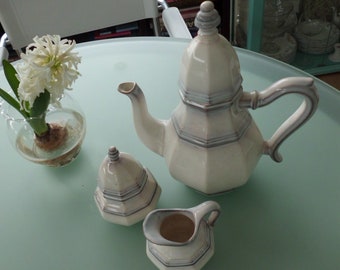 Coffee pot, cream pan, sugar bowl "