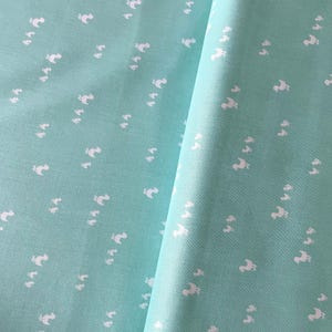Patchwork fabric by Riley Blake with a duck family, turquoise