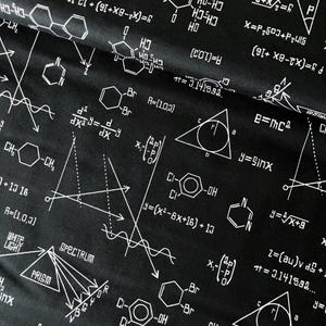 Patchworkstoff von Robert Kaufman, Science Fair, schwarz